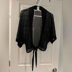 ***😀3 for $35./Black Model France short sleeve front tye shrug.  NWOT.